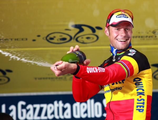 Tom Boonen (Quick Step) has some fun with the spumante on the podium