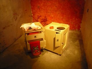 Tea table, made out of crates, with built in ceramic heater, electric water outlet and water collecting tank