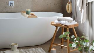 Rustic bathroom with wooden stool