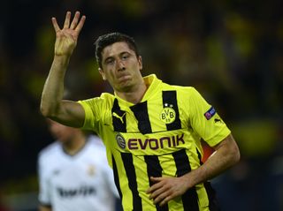 Robert Lewandowski celebrates after scoring four goals for Borussia Dortmund against Real Madrid in a 4-1 win in the Champions League semi-finals in April 2013.