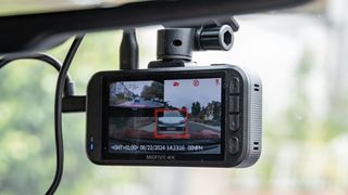 Miofive S1 Ultra dashcam in a car window