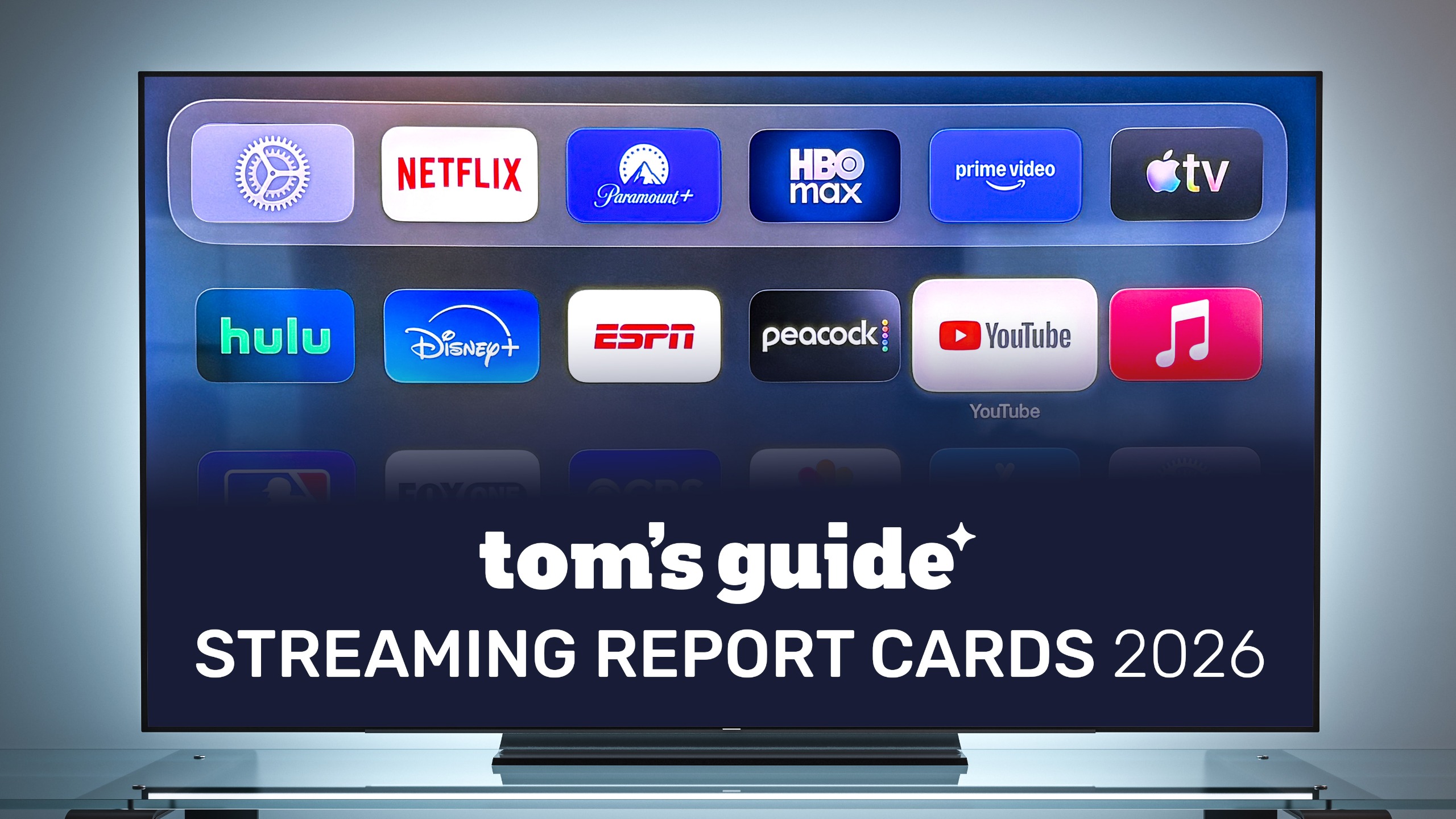 Tom's Guide Streaming Report Card logo shown on a TV screen with streaming app icons in a living room 