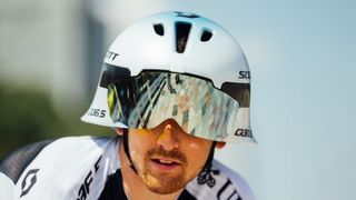 A cyclist from the Giro d'Italia wearing a time trial helemt