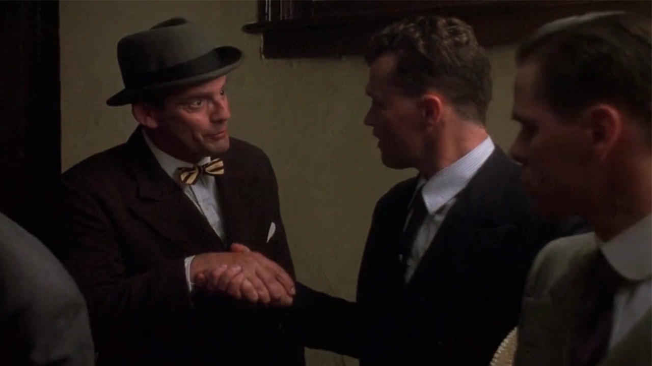 Two men shaking hands in Eight Men Out