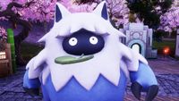 Palworld - Wumpo, a bumbling, large blue and white pal with cat ears and a leaf in its mouth.