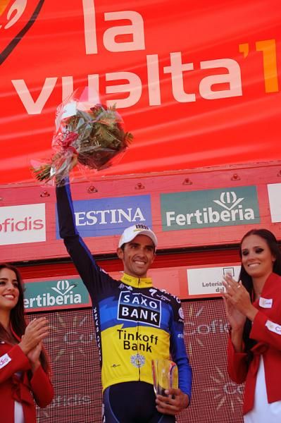 A beaming Alberto Contador on the podium after his solo stage victory in Fuente D&eacute;.