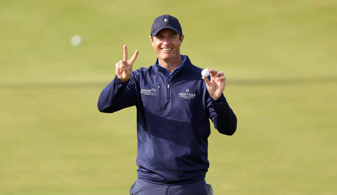 Nicolas Colsaerts does a two sign after making an albatross