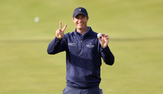 Nicolas Colsaerts does a two sign after making an albatross