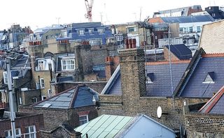 Barnbrook’s studio is in the backstreets behind Piccadilly Circus, and from the roof the West End looks very different – a chaos of brickwork extensions, dormers and aerials.