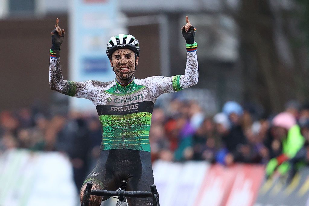 Belgian rider Sanne Cant celebrates her fourteenth Belgian title on the finish line of the womens elite race of the Belgian national cyclocross championship in Lokeren on January 14 2023 Belgium OUT Photo by DAVID PINTENS BELGA AFP Belgium OUT Photo by DAVID PINTENSBELGAAFP via Getty Images