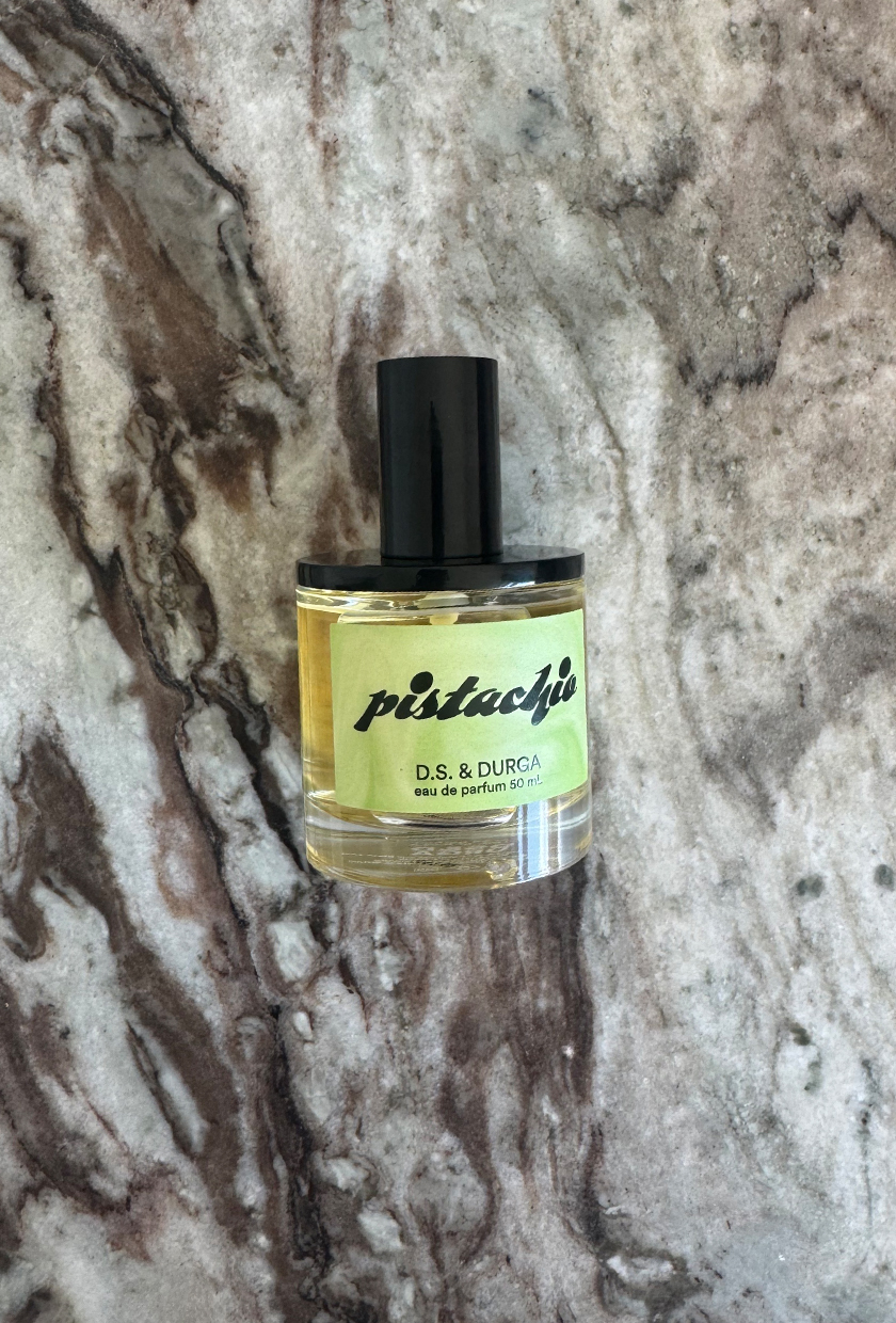 A photo of D.S. &amp;amp; Durga Pistachio perfume on a marble table