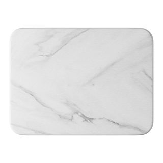 A marble effect kitchen drying mat on a white background