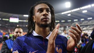 France's midfielder #11 Michael Olise applauds to celebrate the victory at the end of the UEFA Nations League Group A1 football match between Belgium and France at King Baudouin Stadium in Brussels on September 28, 2026.