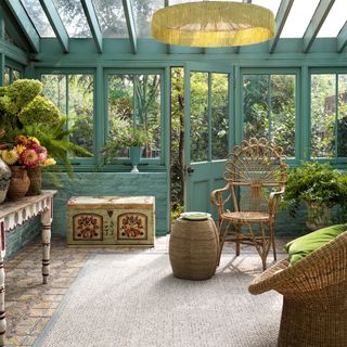 Blue conservatory with yellow lamp