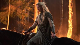 Galadriel (Morfydd Clark) on horseback armed with a bow in Prime Video's "The Lord of the Rings: The Rings of Power" season 2.