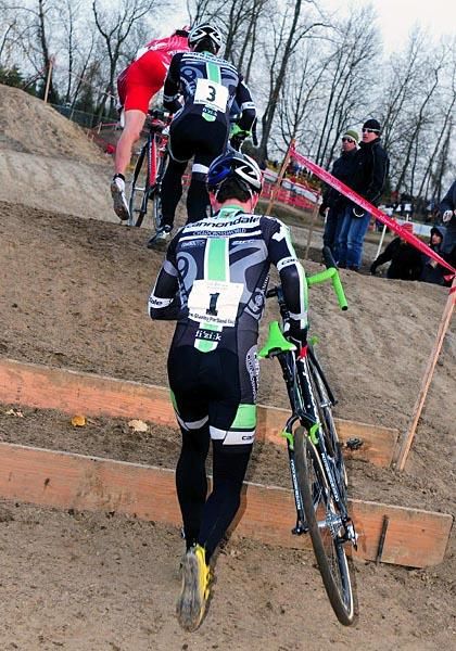 Jeremy Powers (Cannnondale-Cyclocrossworld) and Tim Johnson chasing Todd Wells.