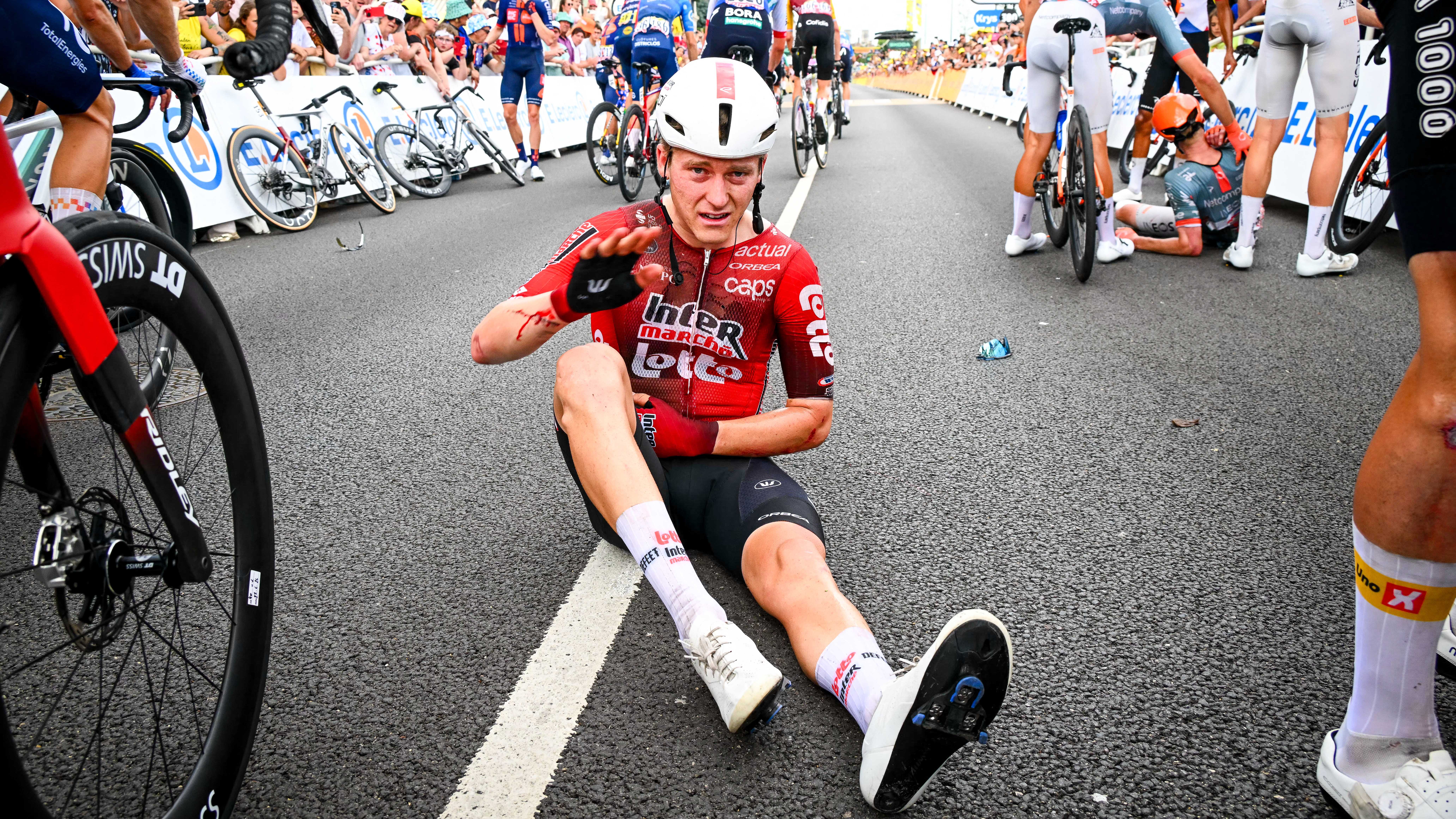 Belgian Jenno Berckmoes of Lotto Intermarche is injured at the end of the stage 12 of the 2026 Tour de France 