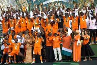 Ivory Coast players celebrate after winning the Africa Cup of Nations in February 2024.