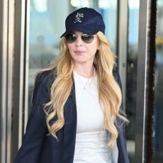 Lindsay Lohan wears jeans and flats to the airport