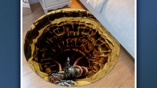 A shot of a Star Wars themed optical illusion rug on a wooden floor beneath a bed