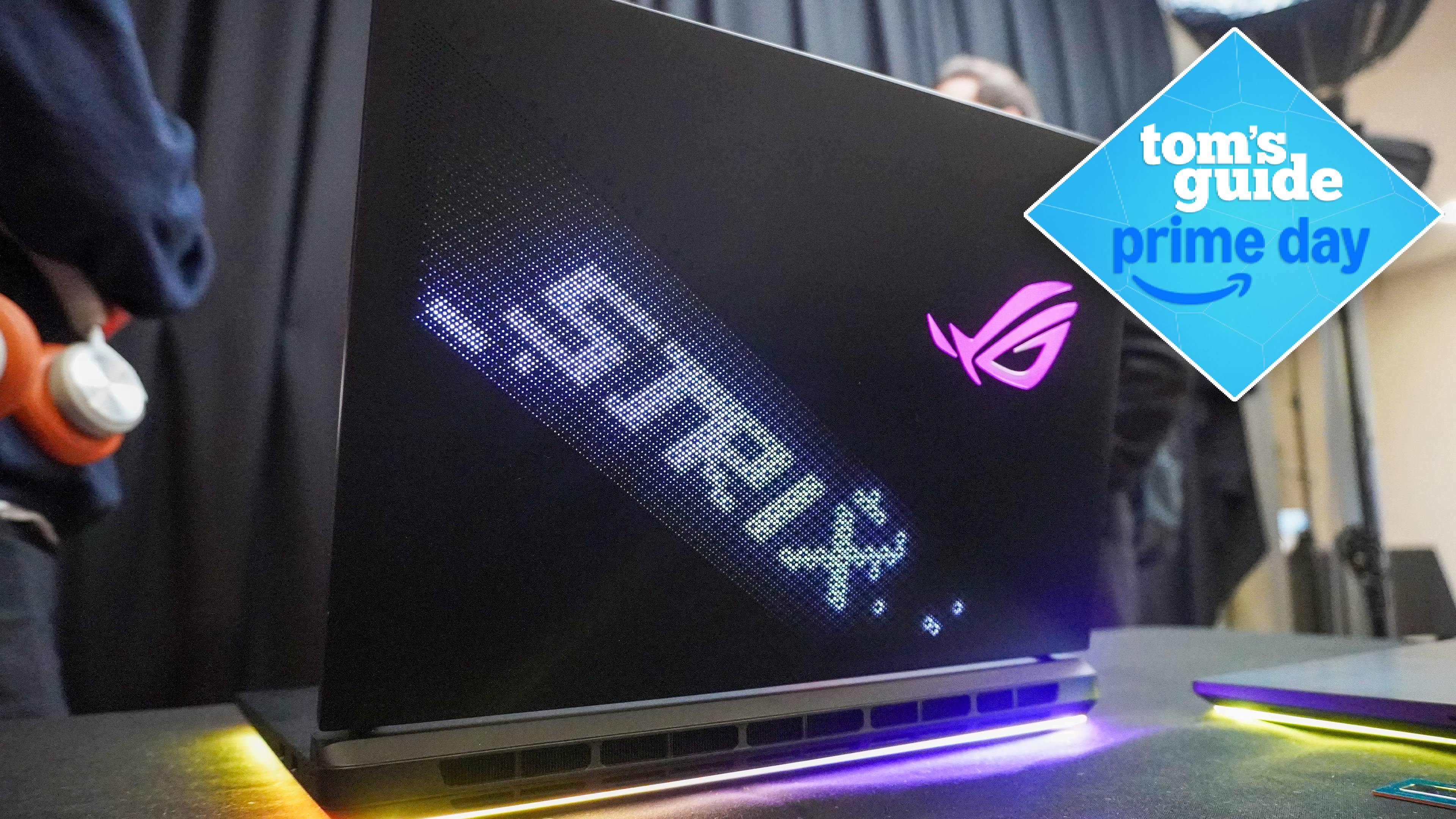 Asus ROG Strix G16 on table showing back of lid with Tom's Guide Prime Day badge