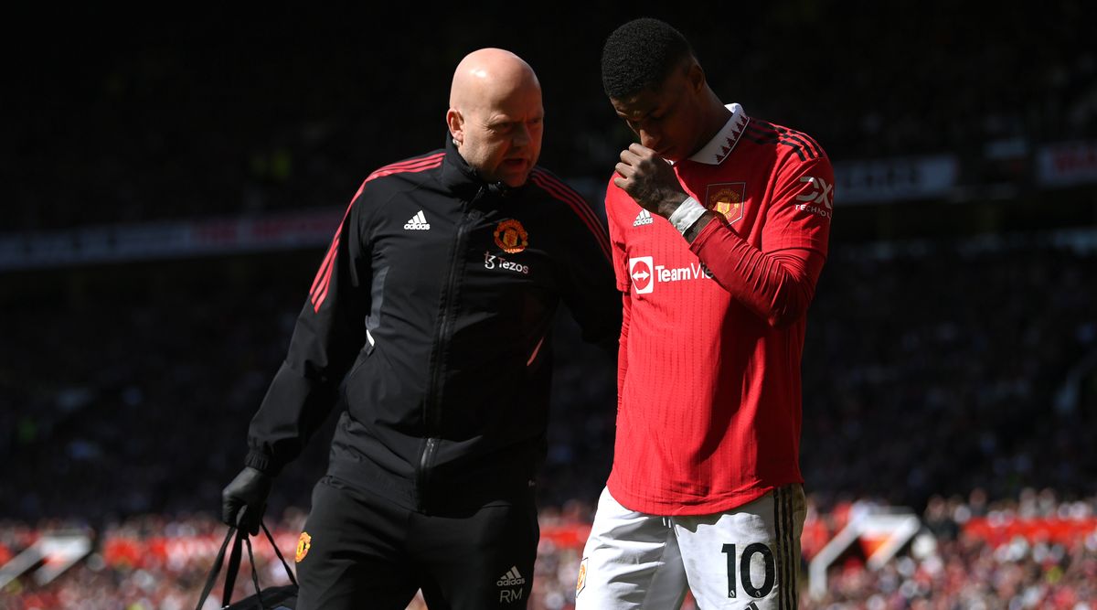 Marcus Rashford of Manchester United leaves the pitch with an injury during the Premier League match between Manchester United and Everton at Old Trafford on April 8, 2023 in Manchester, United Kingdom.