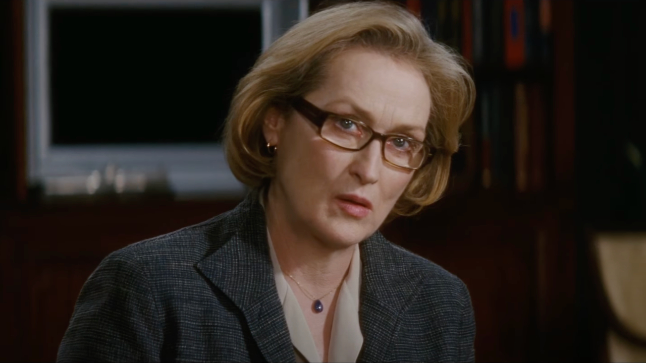 Meryl Streep looks perplexed as she sits in an office in Lions for Lambs.