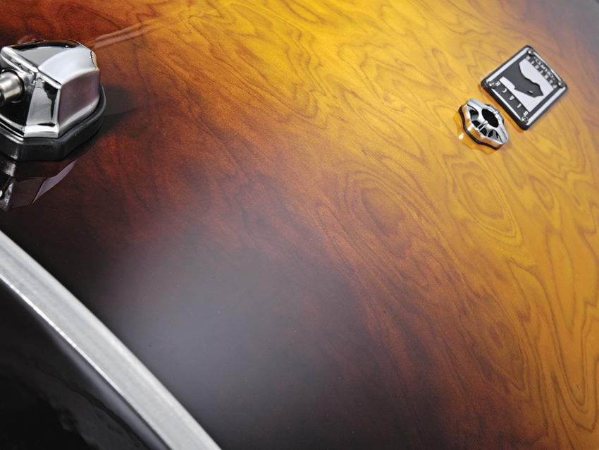 Butter burst brings out the extravagantly swirling grain of the Italian burl maple veneer.