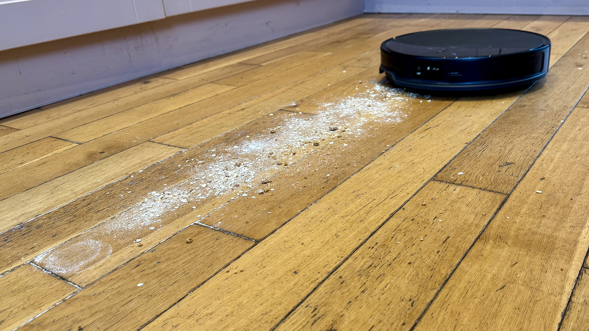 Roborock Saros 10R robot vacuum and mop before completing hard floor vacuuming test 