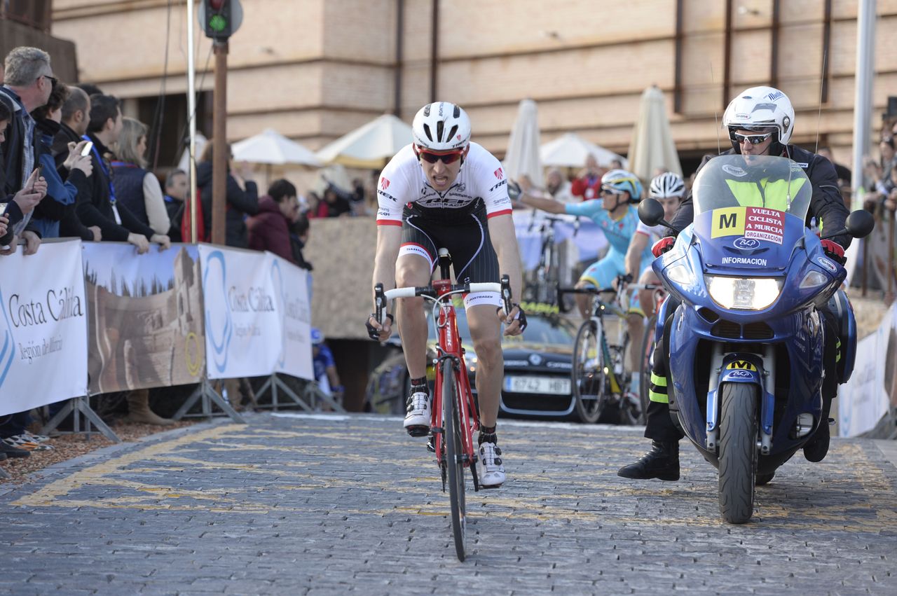 Bauke Mollema (Trek Factory Racing) dodged a car near the finish line to take second place