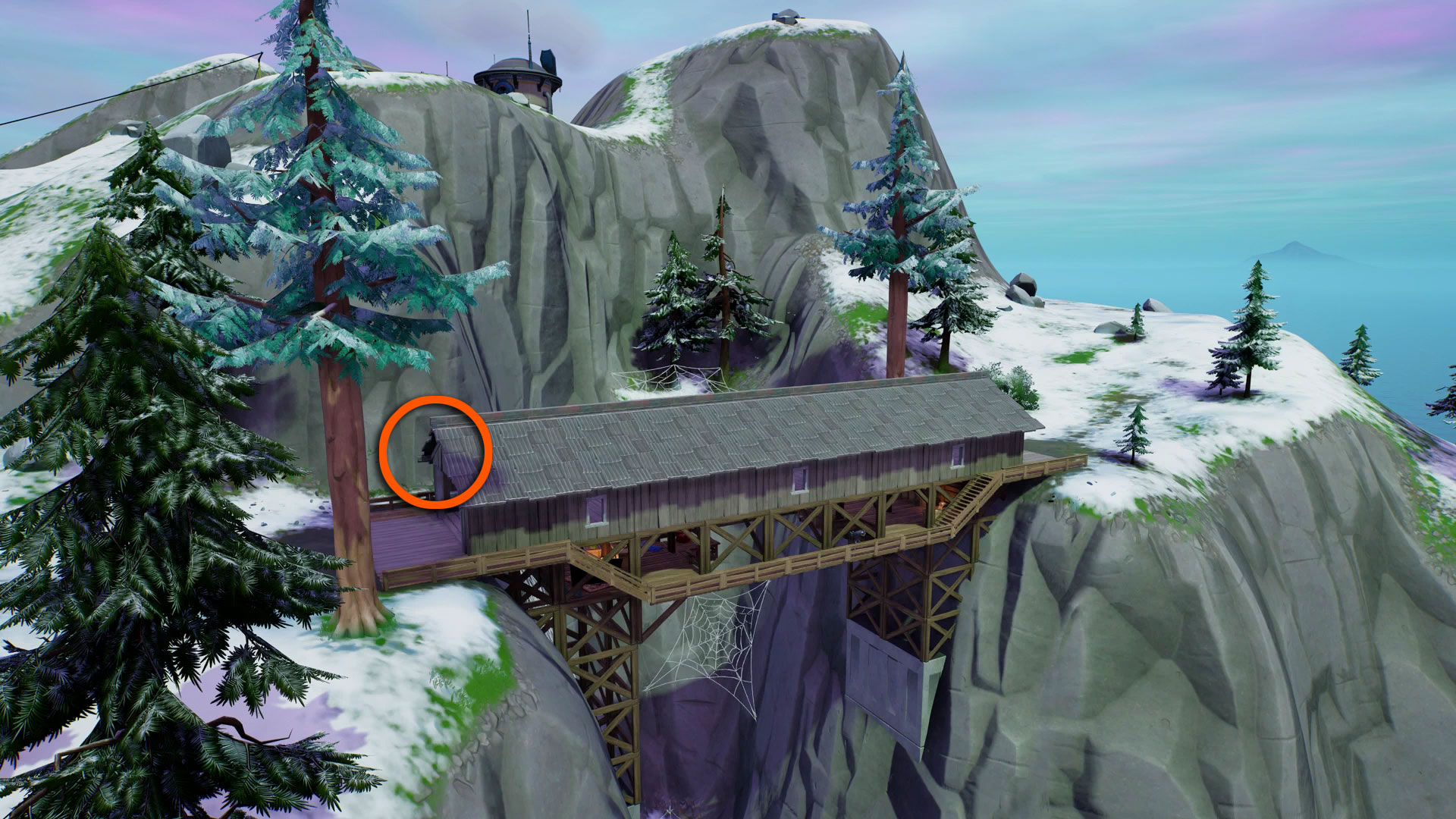Swing under an arch at Desert Arch, Big Bridge, or Covered Bridge in Fortnite