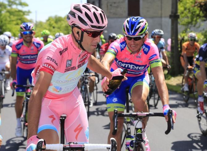 A bit of on-the-road celebrating between maglia rosa Vincenzo Nibali (Astana) and Filippo Pozzato (Lampre-Merida)
