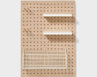 Wooden pegboard with shelves and hooks