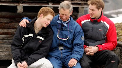 HRH Prince Charles poses with his sons Prince William (R) and Prince Harry (L) during the Royal Family's ski break at Klosters on March 31, 2005 in Switzerland. during a photocall on the Royal Family's ski break in the region at Klosters on March 31, 2005 in Switzerland. 