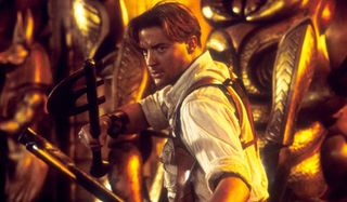 Brendan Fraser armed with dual axes in The Mummy Returns.