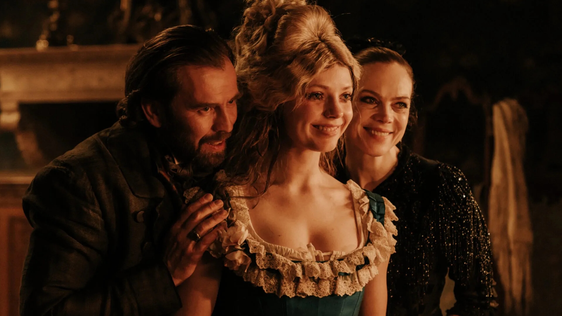 Three people smile while looking into a mirror with a sinister feel to it