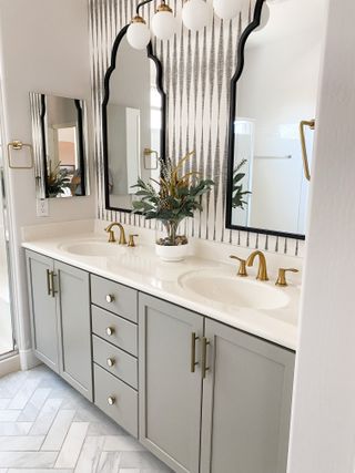 bathroom remodel with wallpaper and gray vanity brooke waite