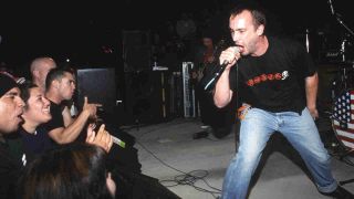 Clutch’s Neil Fallon performing onstage in 2001