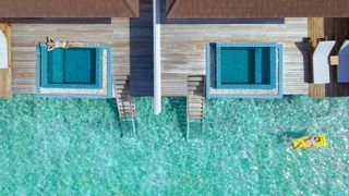 Luxury villas over blue lagoon