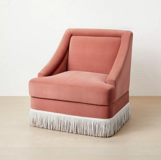 Pink accent chair with fringe