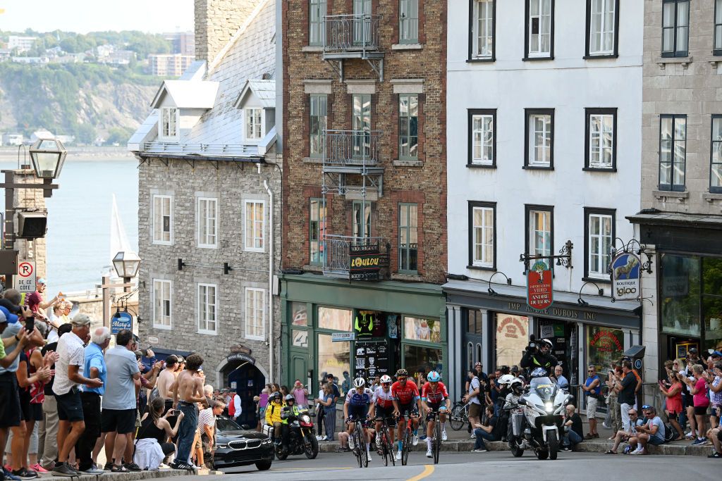 QUEBEC CITY QUEBEC SEPTEMBER 09 A general view of Damiano Caruso of Italy and Team Bahrain Victorious Stan Van Tricht of Belgium and Team QuickStep Alpha Vinyl Hugo Toumire of France and Team Cofidis and Sbastien Grignard of Belgium and Team Lotto Soudal compete in the breakaway passing through Qubec City during the 11th Grand Prix Cycliste de Qubec 2022 a 2016km one day race from Quebec to Quebec GPCQM on September 09 2022 in Quebec City Quebec Photo by Dario BelingheriGetty Images