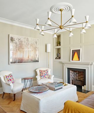 sitting room with statement chandelier