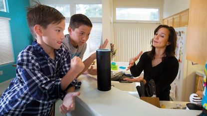 People getting excited by a smart speaker