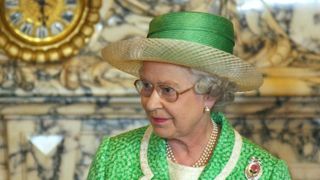 Queen Elizabeth II prepares to deliver a speech at the Senate