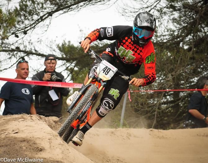 Tommy Herrmann riding the top of a berm