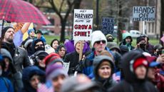 Protesters urge Harvard to take a stand against President Donald Trump