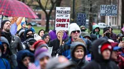 Protesters urge Harvard to take a stand against President Donald Trump