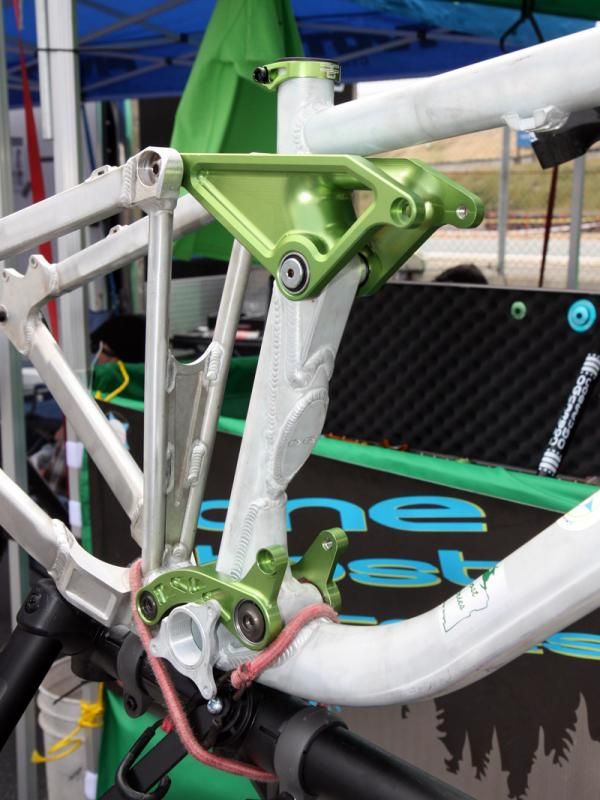 The rear shock floats between the upper and lower pivots on One Ghost's new Musashi downhill frame.
