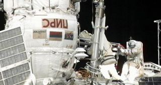 Spacewalking Cosmonauts Upgrade International Space Station