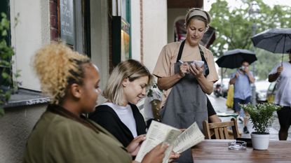 Customers dining at a cafe